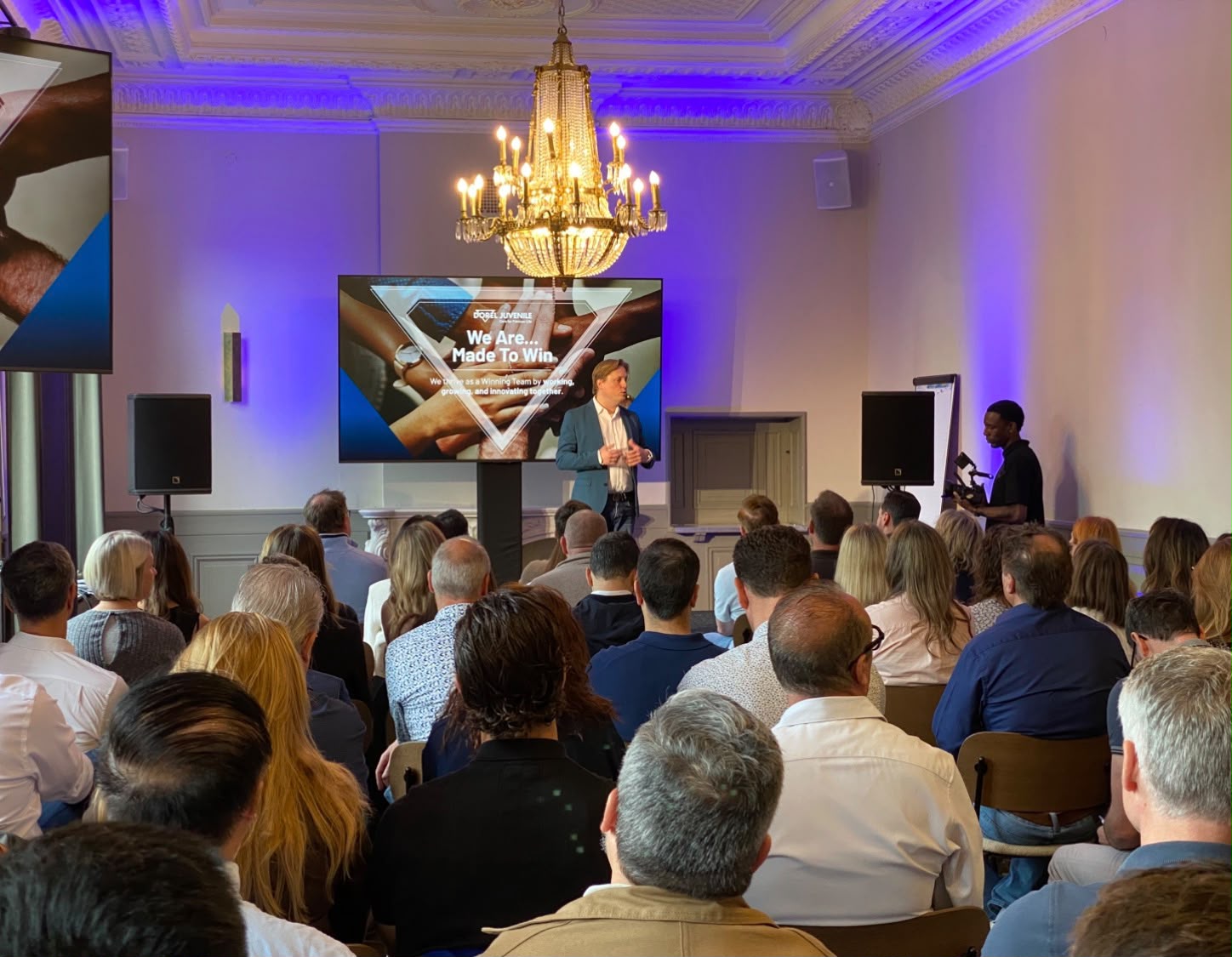 Corporate presentation with screens, audio and camera